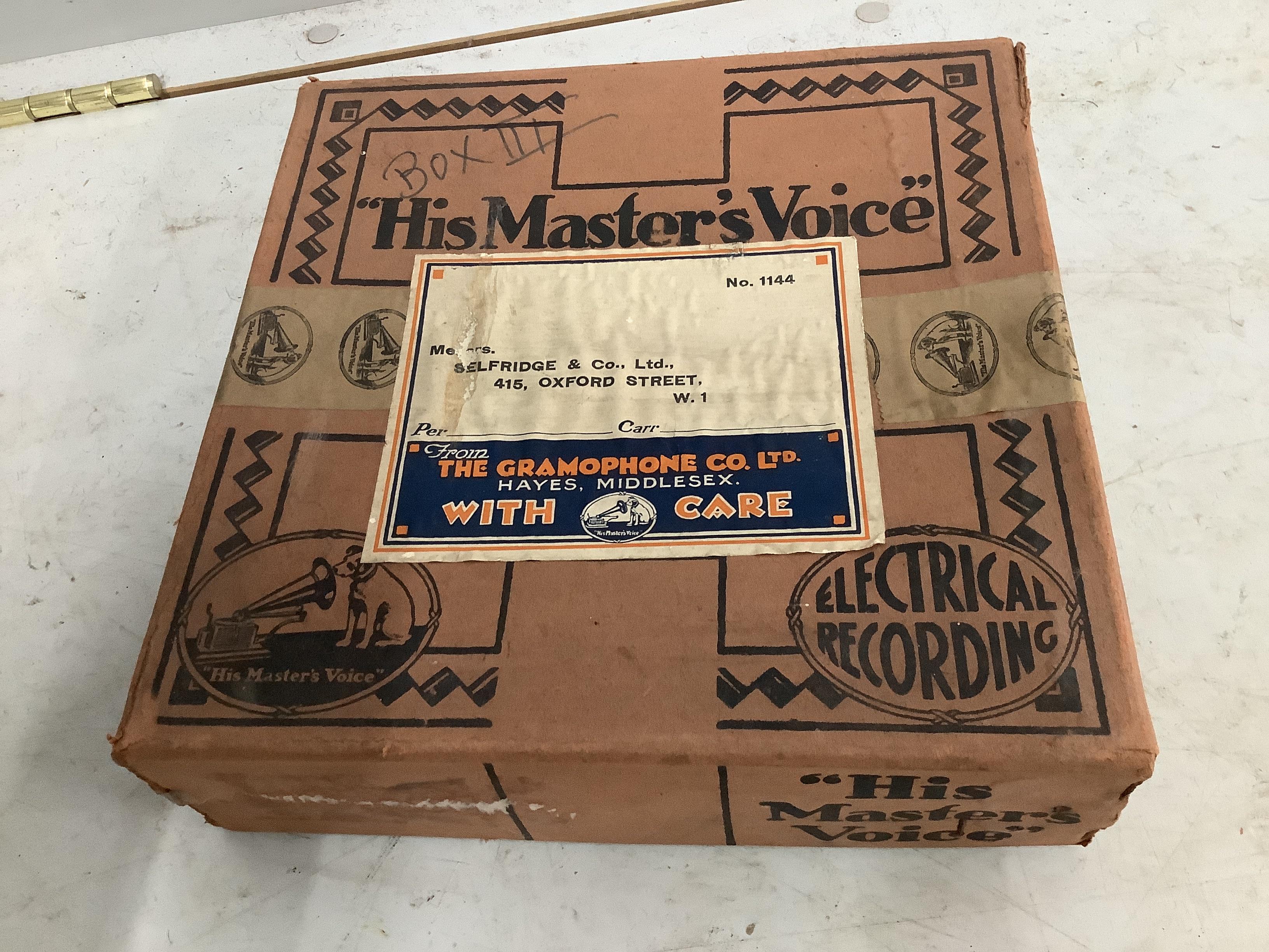 An early 20th century oak cased wind-up gramophone 'The Minstrel', width 74cm, depth 46cm, height 82cm, together with a small quantity of 78 rpm records
